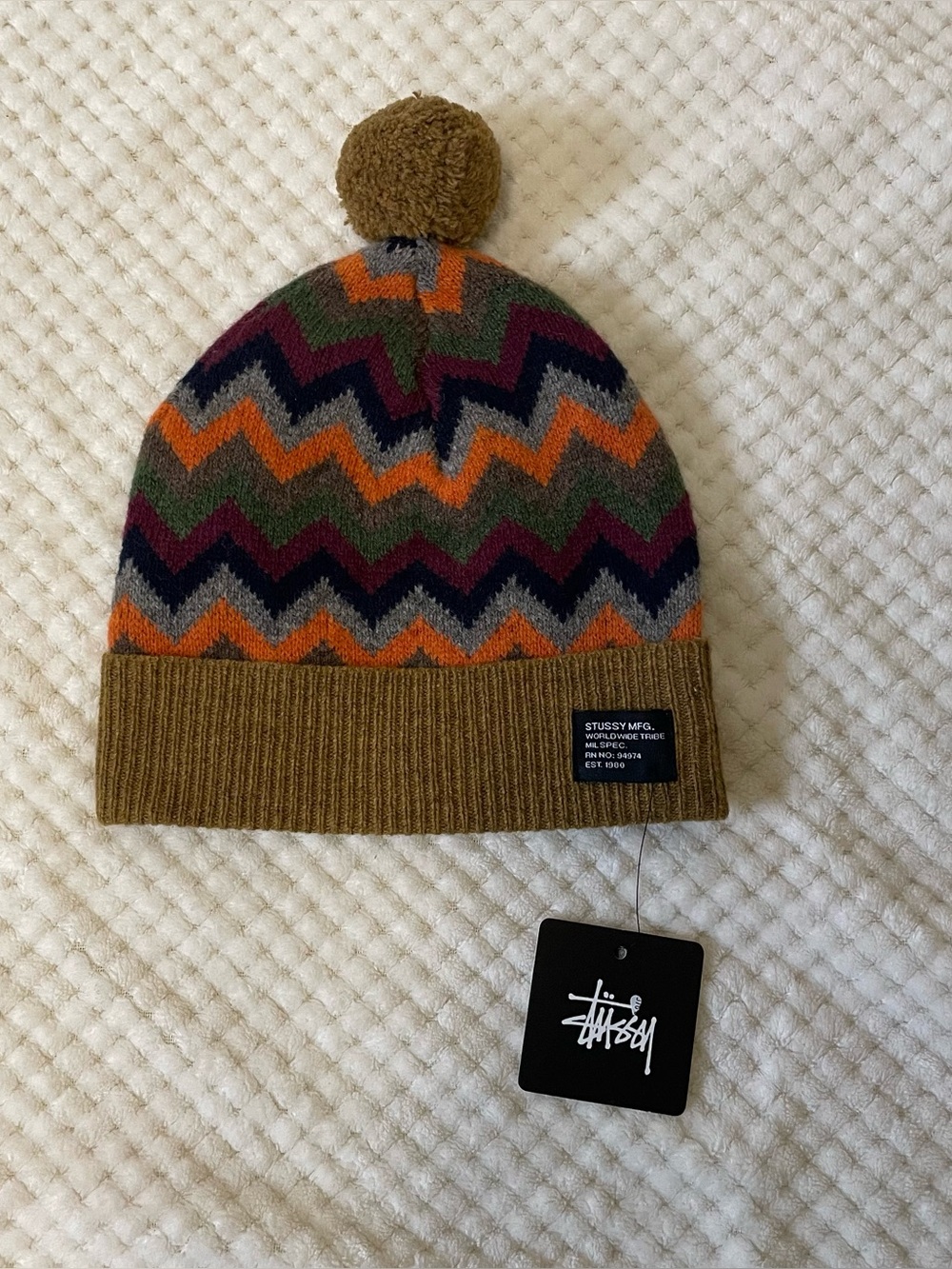 Stussy Multicolor Zigzag Pom Beanie in Olive, Orange, Navy, Burgundy